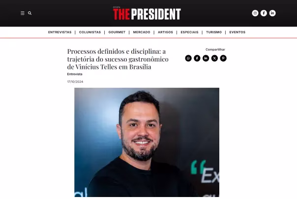 Captura de tela de um artigo on-line com uma manchete sobre o sucesso gastronômico de Vinícius Telles em Brasília, com um retrato dele sorrindo abaixo do título.