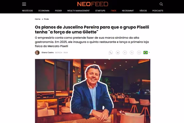 Um homem de terno está de pé e sorri em um restaurante moderno, apresentado em um artigo de notícias no site NeoFeed sobre planos de negócios para o Piselli Group.